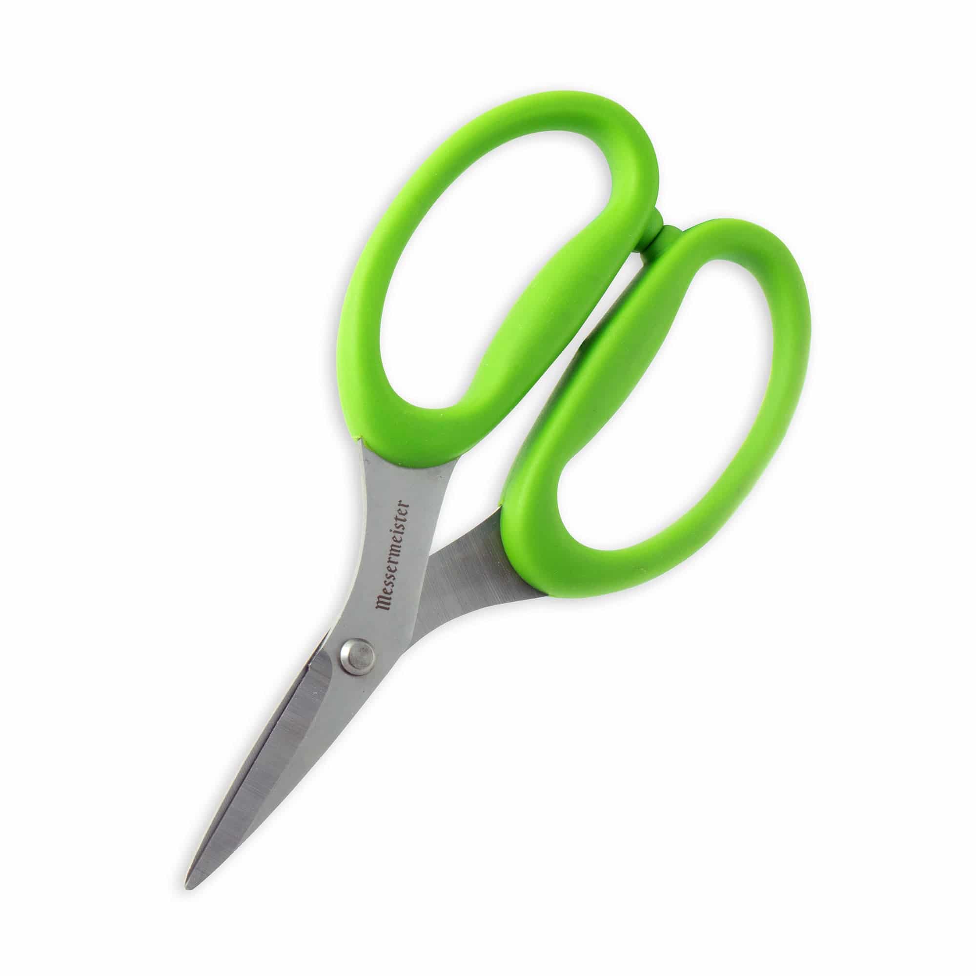 Messermeister 6-inch green culinary scissors shown at an angled downward view, featuring sharp stainless steel blades and ergonomic green handles designed for precise kitchen cutting and food prep tasks