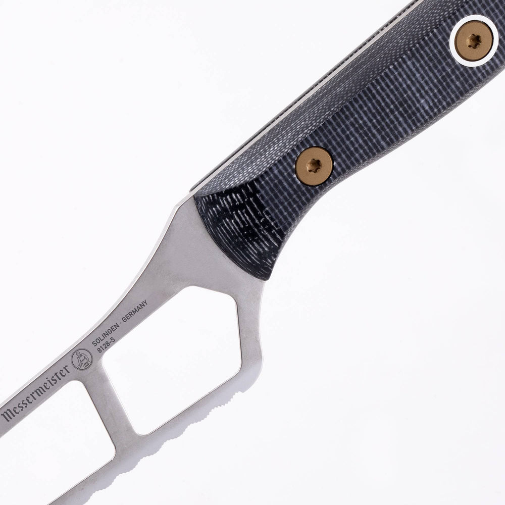 Close-up view of Messermeister Custom Cheese & Tomato Knife heel, showing the transition from handle to serrated blade edge