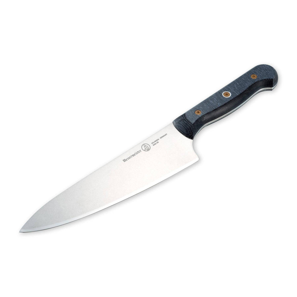 Messermeister 8-inch chef knife close-up angled down highlighting precision-forged blade and edge detail and linen micarta handle texture