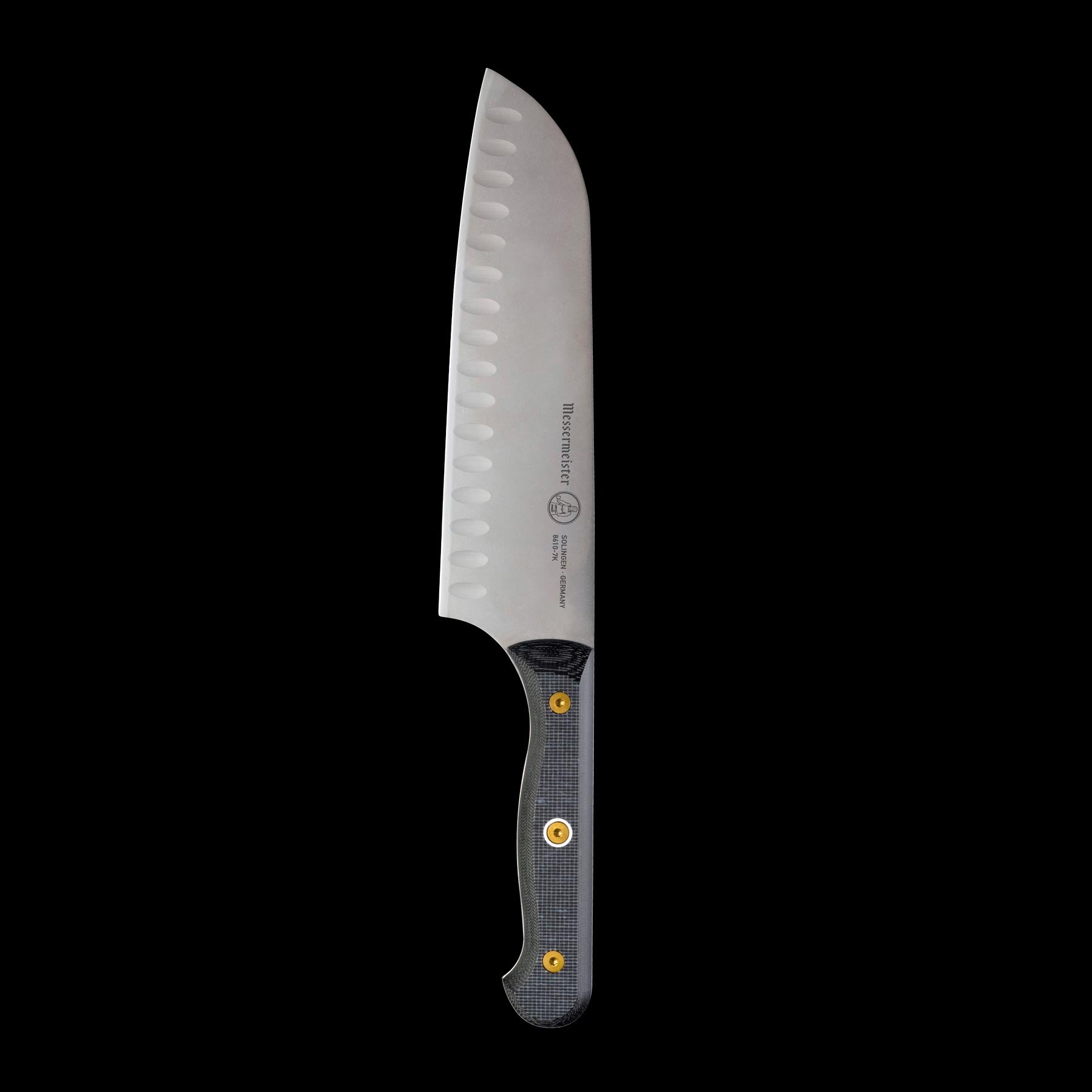 Messermeister 7-inch santoku knife upright view showing kullens (granton edge) and precision stainless steel blade and linen micarta handle 