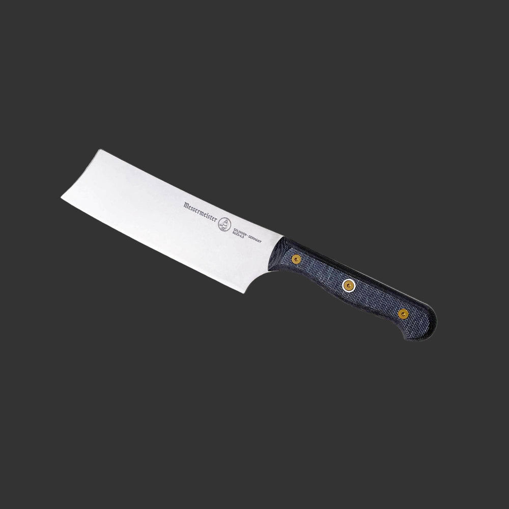 Messermeister custom 6.5-inch nakiri knife upright close view highlighting wide straight-edge blade for vegetable prep