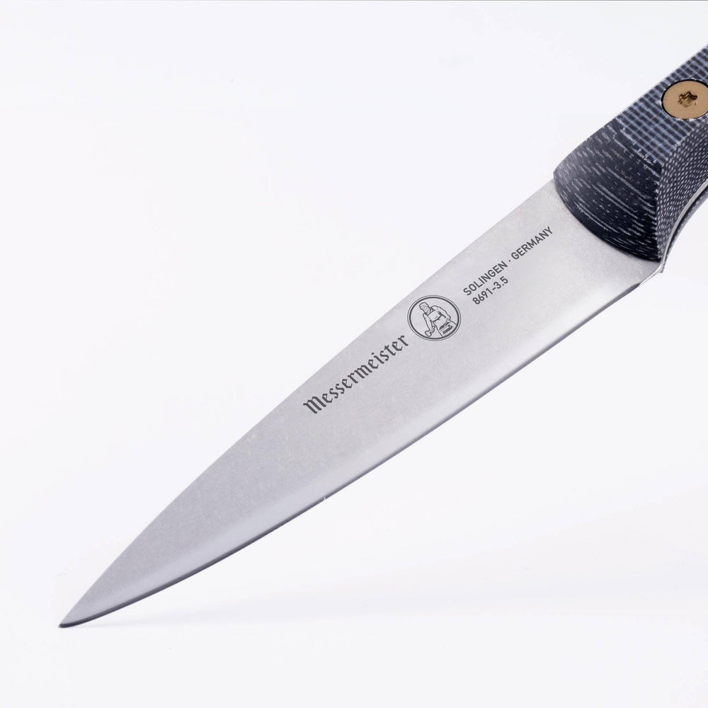 Messermeister Custom Paring Knife 3.5-inch close-up of blade, featuring a sharp precision edge for detailed food preparation