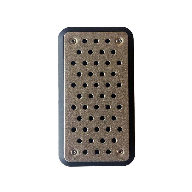 Messermeister Diamon stone showing a perforated metal bottom 4.25 inch by 2.25 inch with Phillip's head screws in each corner and a black rubber border along all edges on a white background