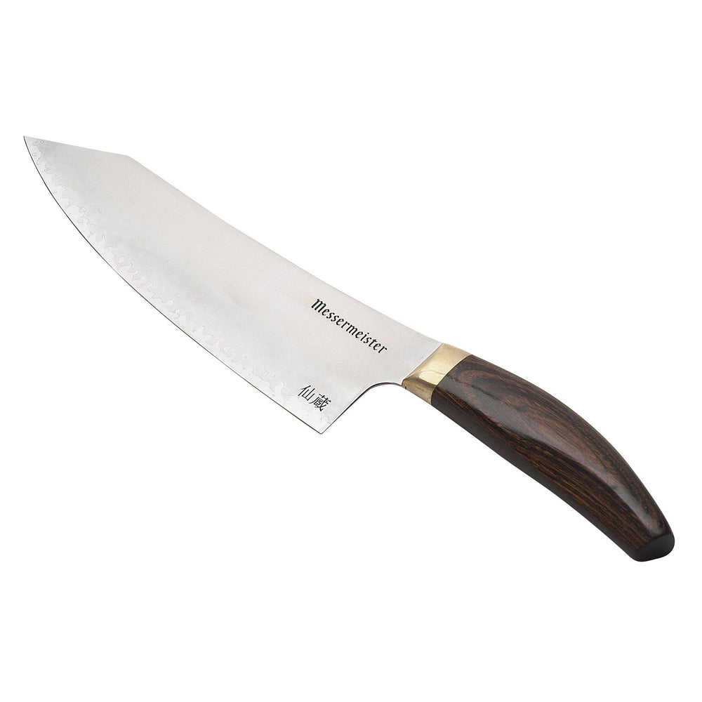 Kawashima 8 inch chef knife angled up san mai steel blade with gold bolster and walnut pakkawood handle on a white background.