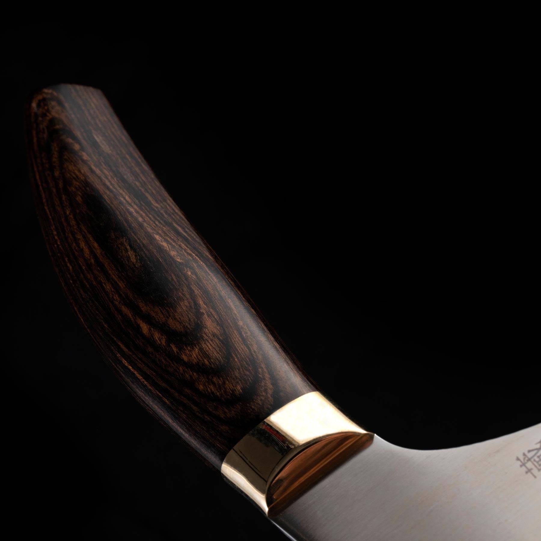 Messermeister Kawashima 10 inch Slicer close up of gold bolster and Walnut Pakkawood Handle 