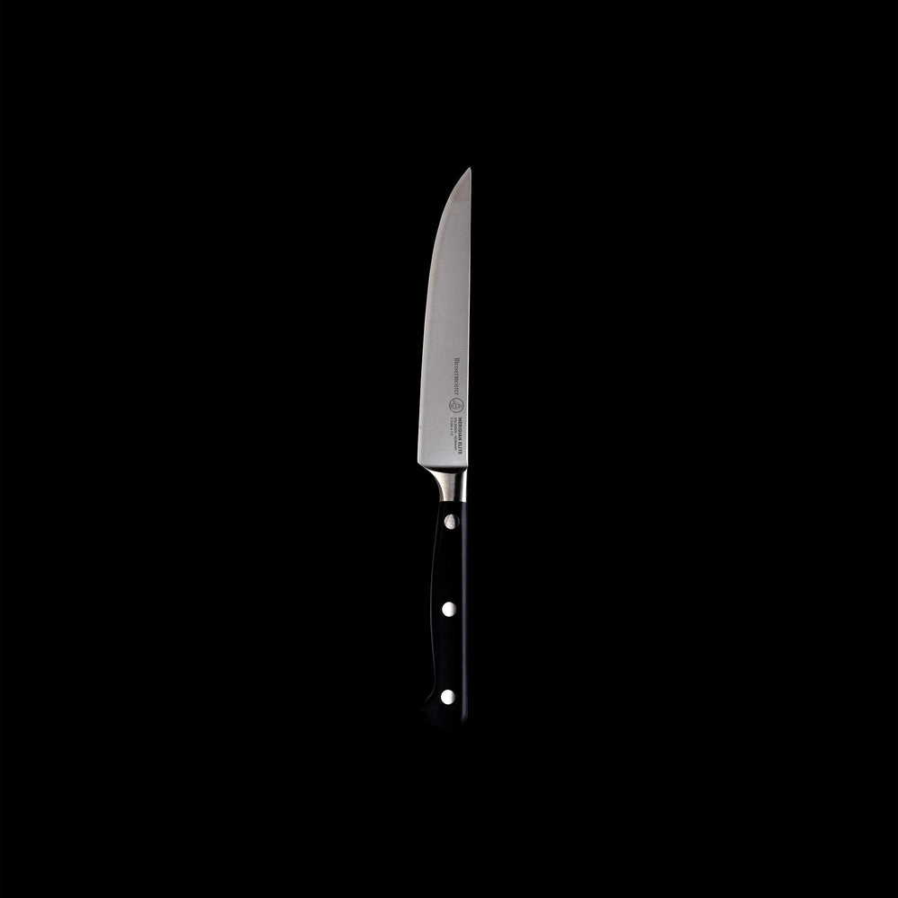 One of four Meridian Elite fine edge steak knives with triple rivet black handle and stainless steel blade