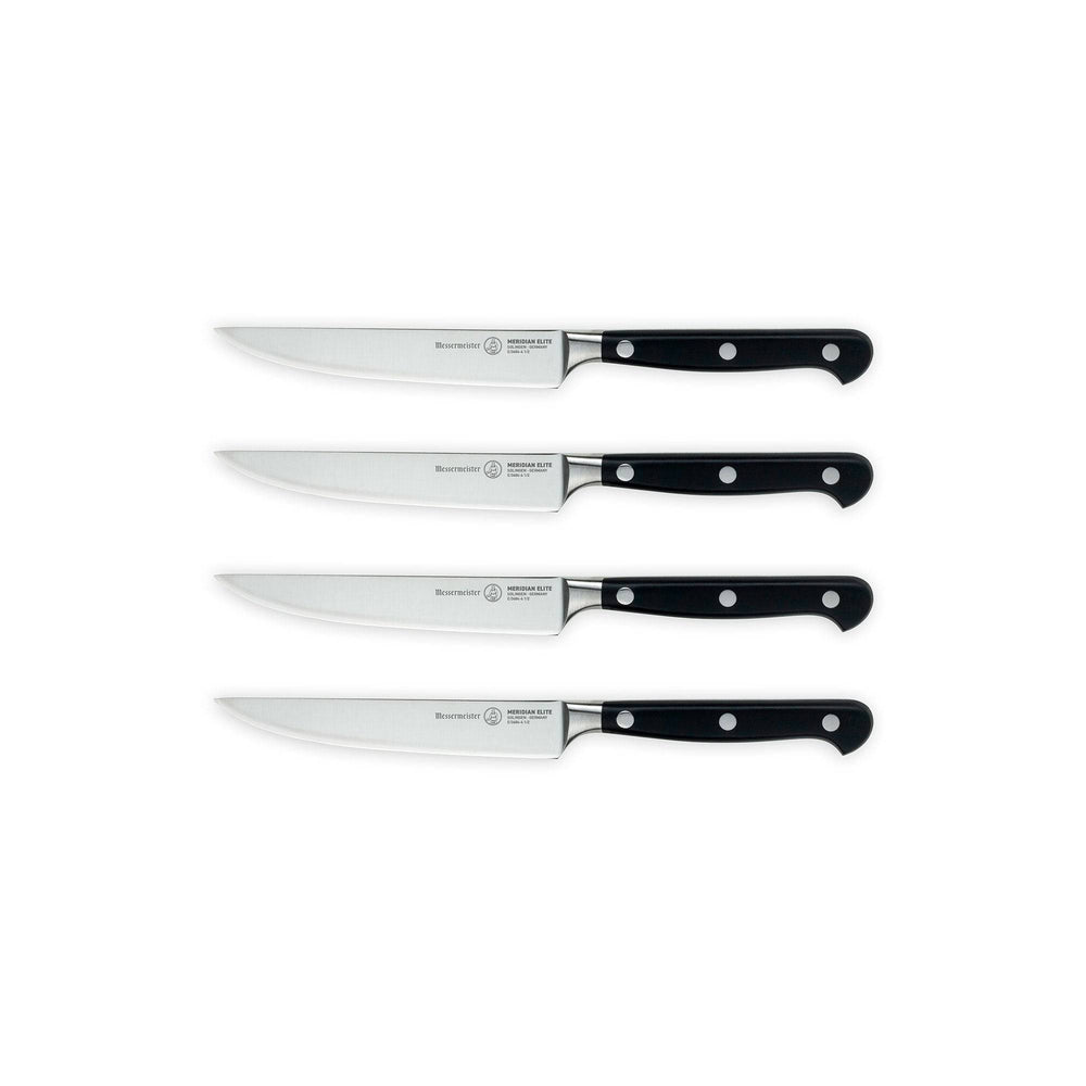 A set of four Meridian Elite fine edge steak knives with triple rivet black handles and stainless steel blades side view pointing left