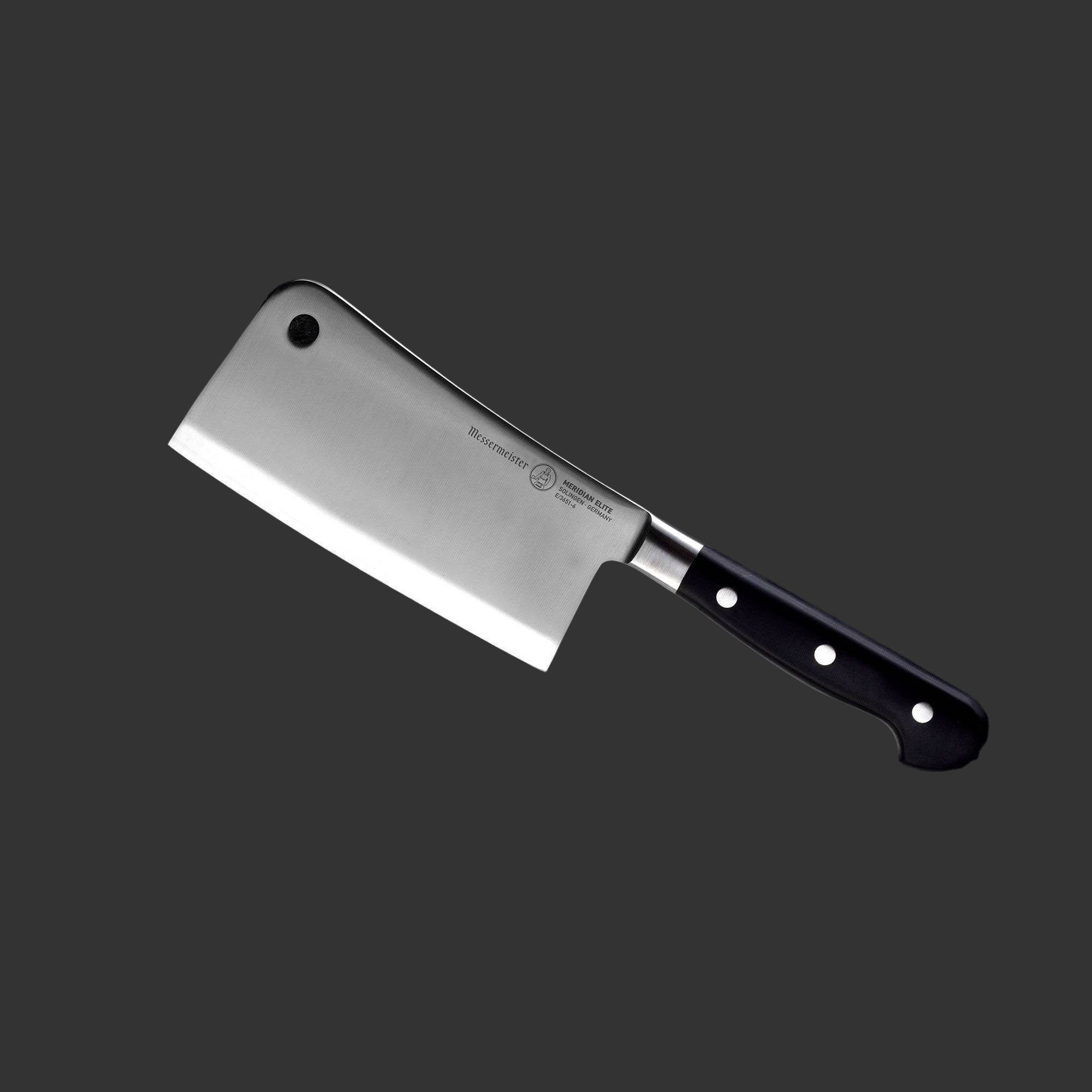 Angled view of the Meridian Elite 6 inch heavy cleaver with triple rivet black handle and a silver stainless steel blade pointing to upper left