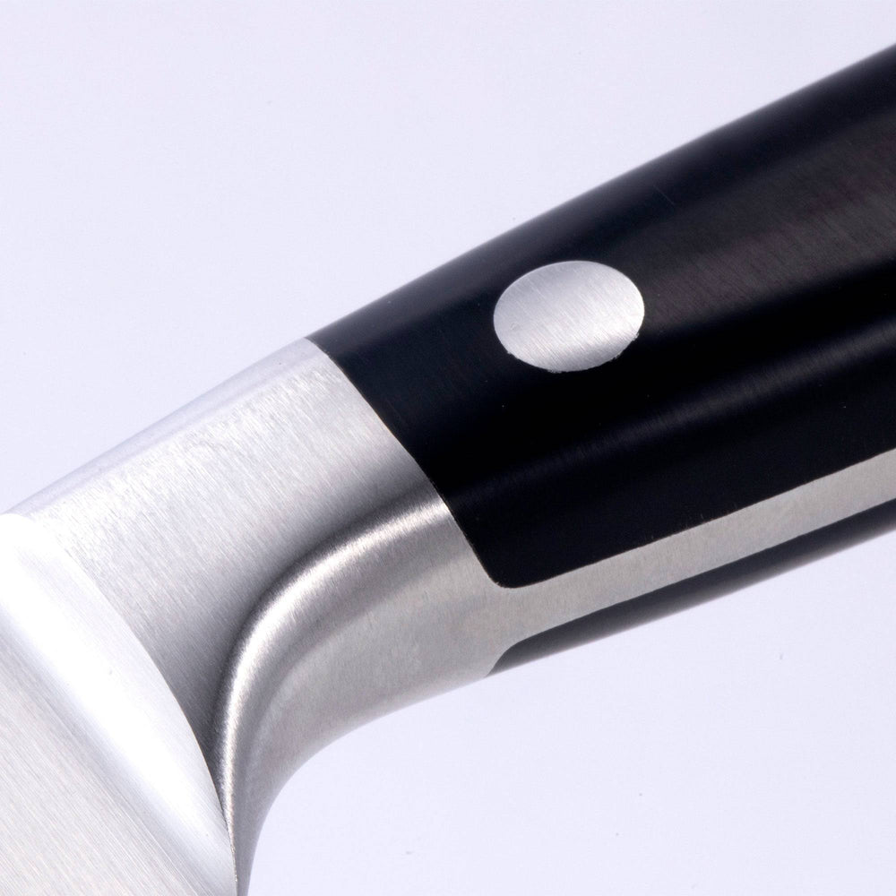 A close up of the 8 inch Meridian Elite Kullens carving knife showing the bolster and heel