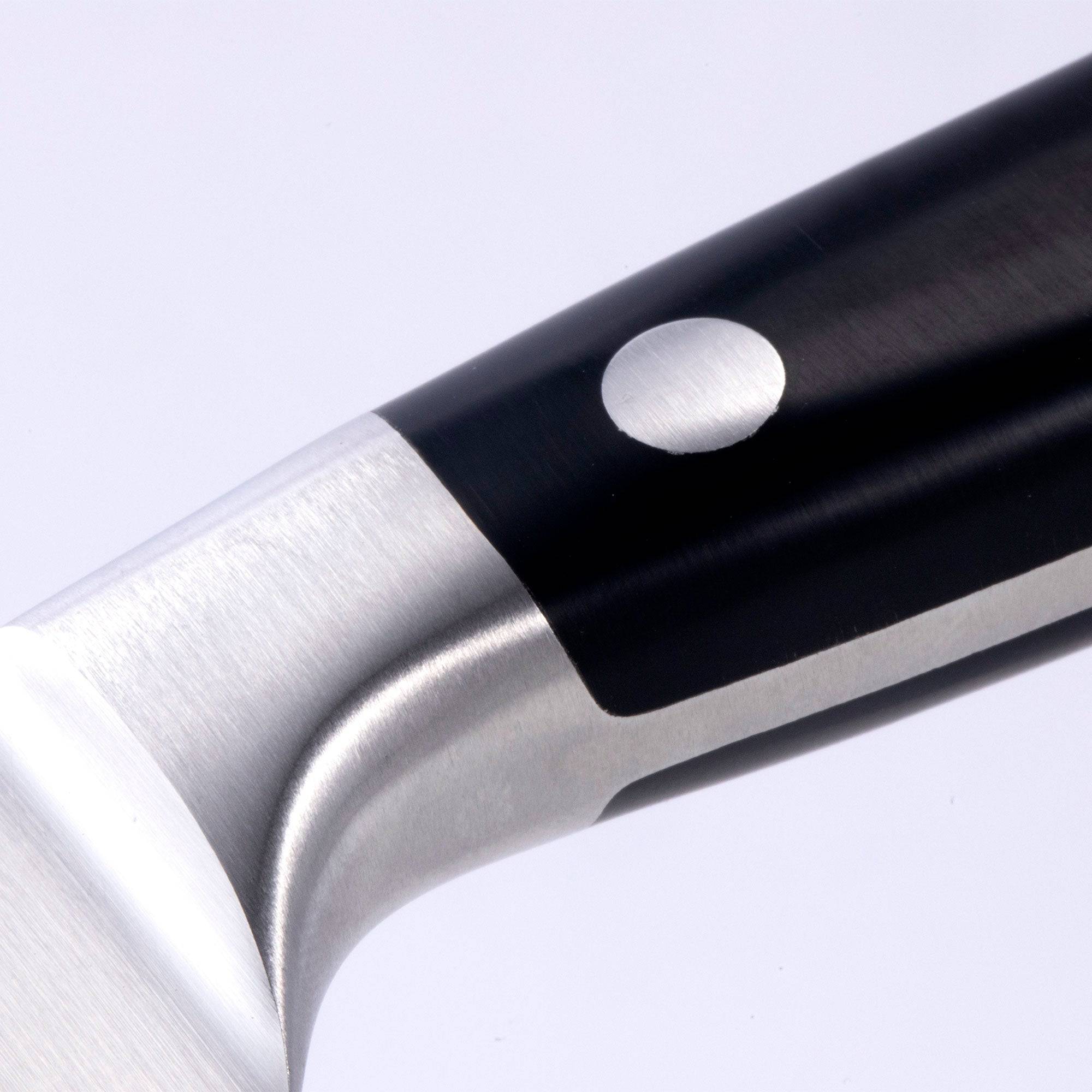 A close up of the 8 inch Meridian Elite Kullens carving knife showing the bolster and heel