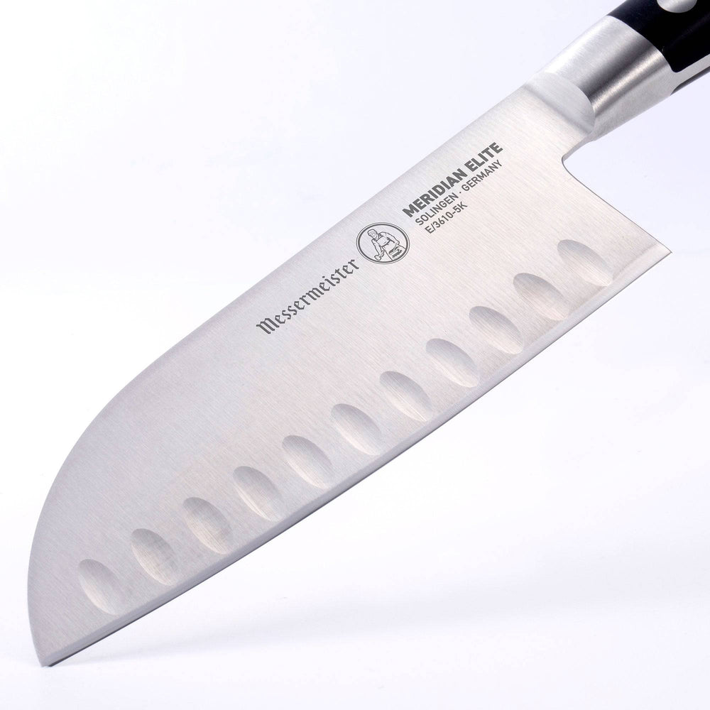 Close up of the entire blade of the 7 inch Meridian Elite Kullens Santoku showing logo