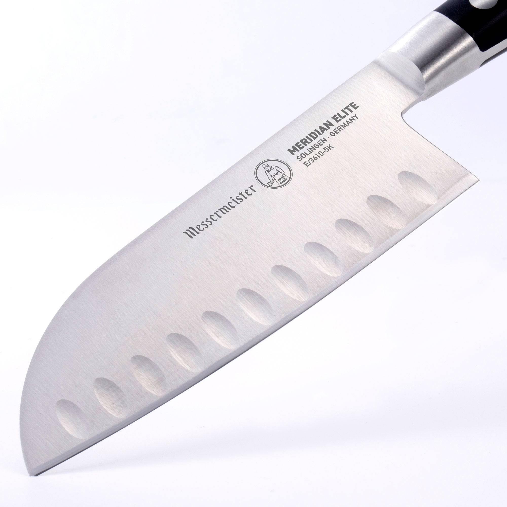 Close up of the entire blade of the 7 inch Meridian Elite Kullens Santoku showing logo