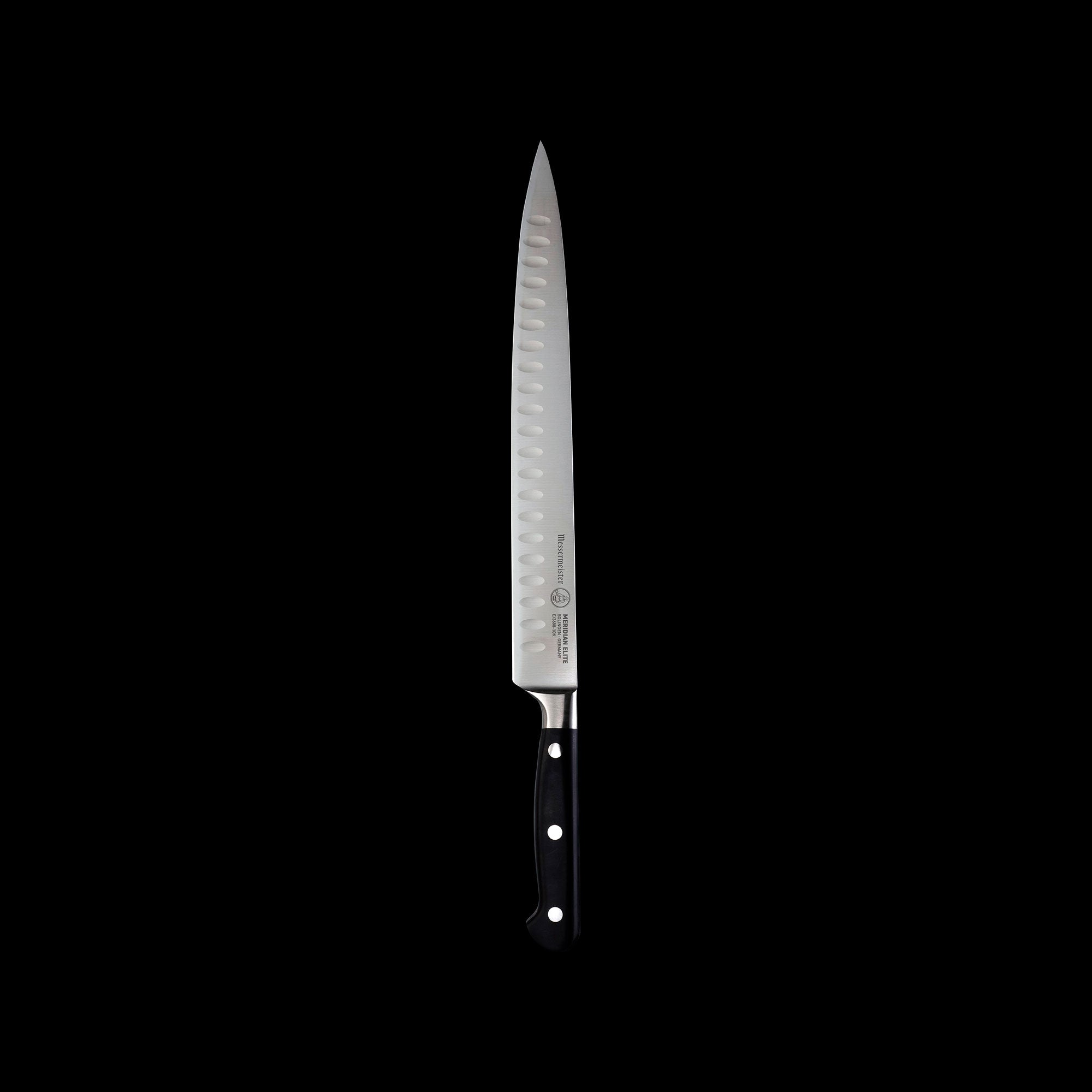 A 10 inch Meridian Elite Kullens carving knife with a narrow spearpoint, fine edge stainless steel blade and triple rivet black handle full view pointing up