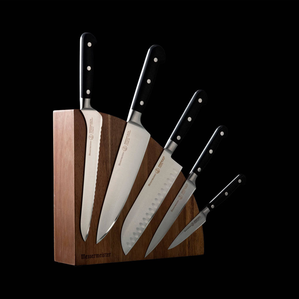 Messermeister Meridian Elite 6 Piece Magnet Block Set - side view with Bread, Chef's, Santoku, and Utility knife showing. Mounted on the quarter circle magnetic block.