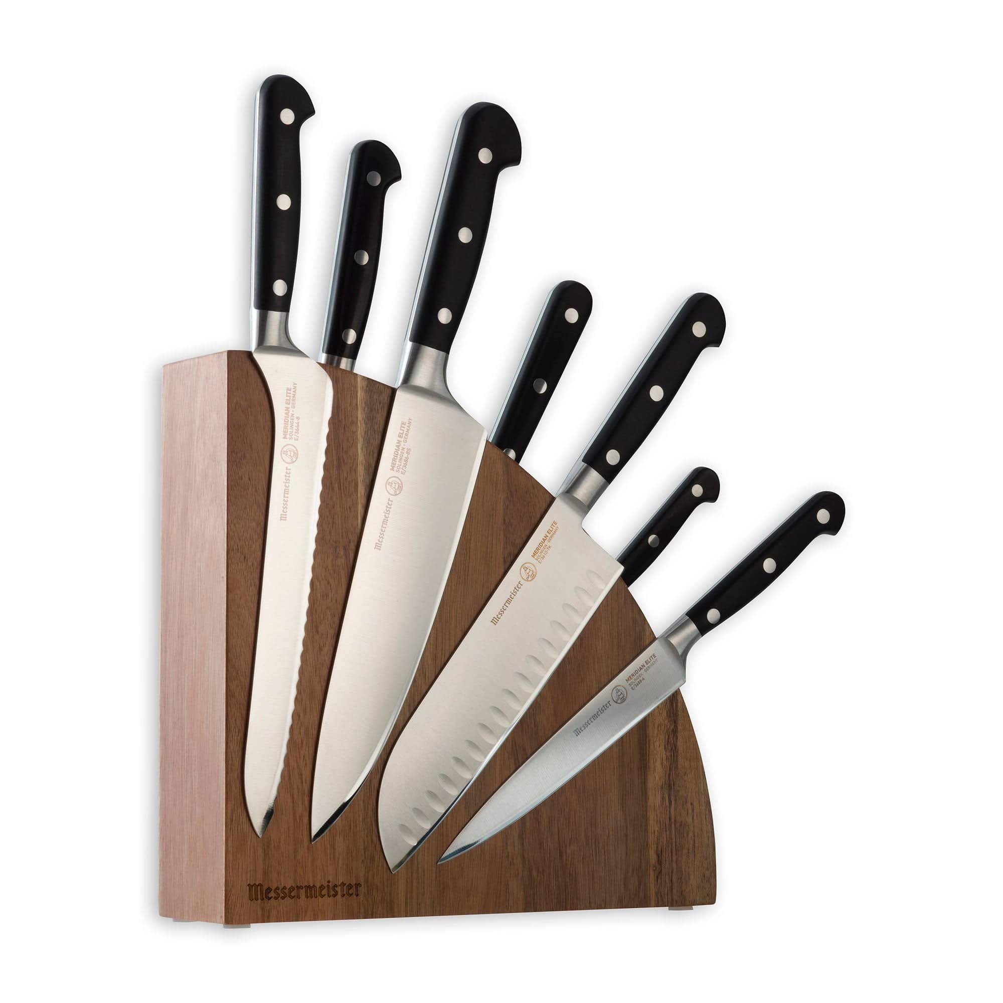 Messermeister Meridian Elite Magnet Block Set - 8 Piece - side view with Bread, Chef's, Santoku, and Utility knife showing. Other knife handles show in the background. Messermeister magnetic block.