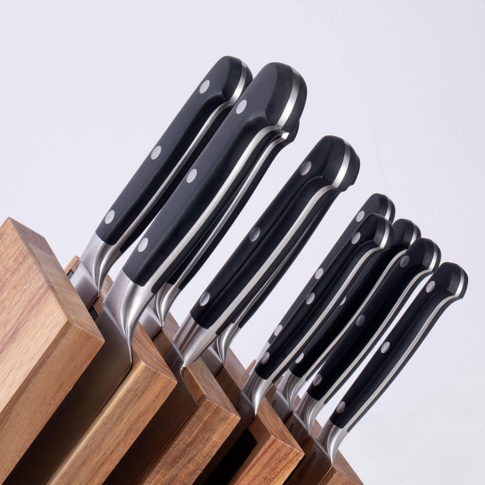 Messermeister Meridian Elite 11 Piece Next Level Block Set close up of triple rivet black knife handles extending out from knife block