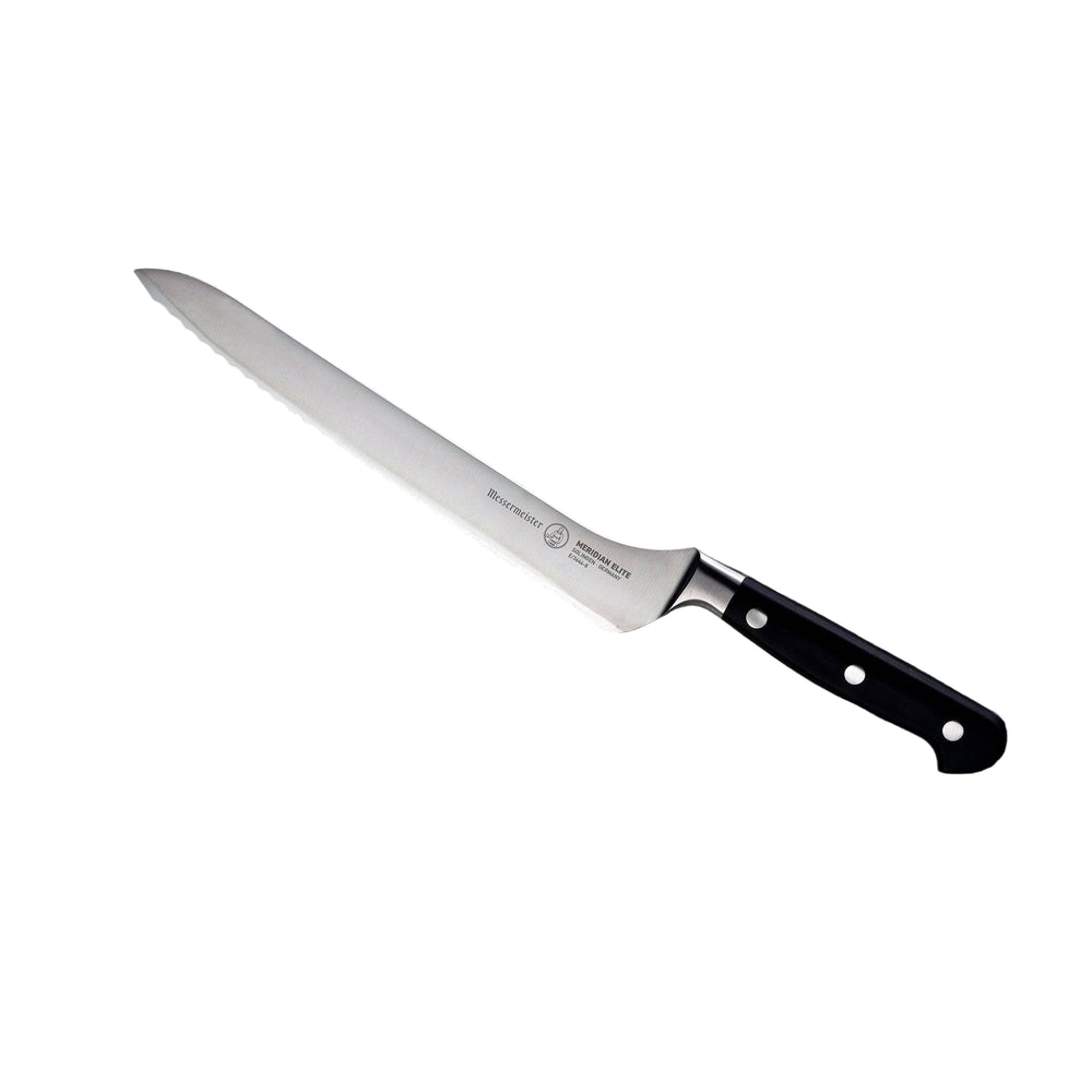 Angled view of the 8 inch Meridian Elite Offset Scalloped Bread Knife with a stainless steel blade and triple rivet black handle pointing to upper left