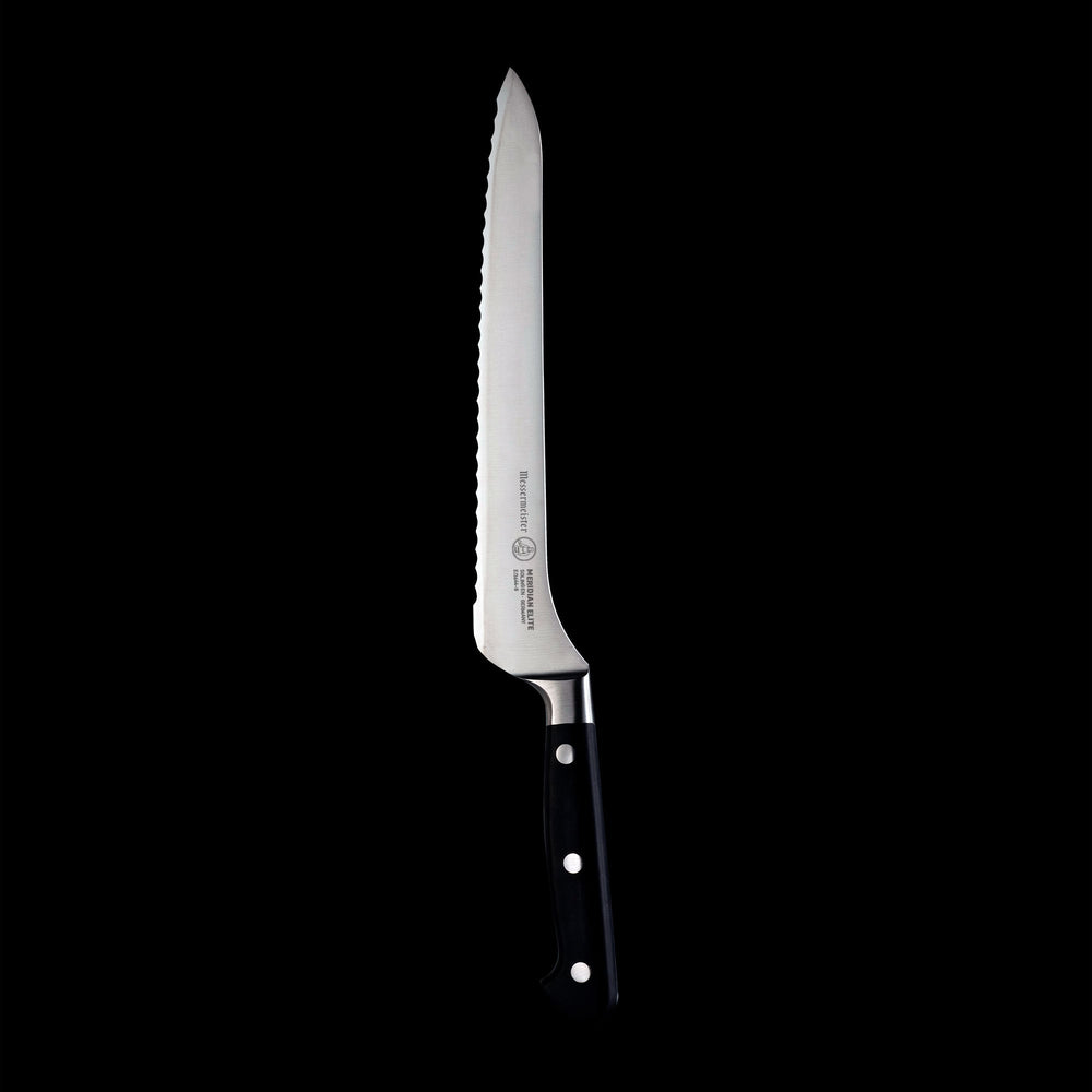 Vertical view of the 8 inch Meridian Elite Offset Scalloped Bread Knife with a stainless steel blade and triple rivet black handle.