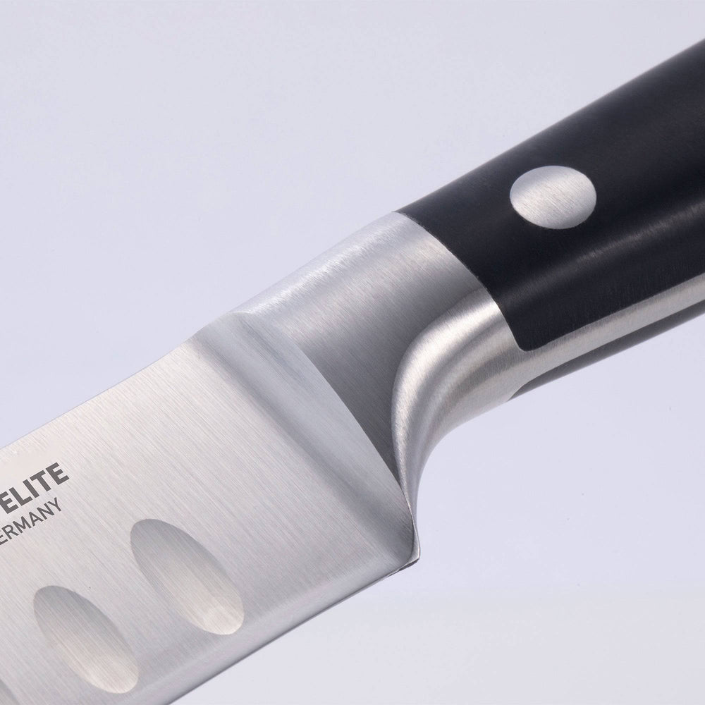 A close up view of the bolster and heel of the 10 inch Messermeister Meridian Elite Round Tip Kullens Slicer 