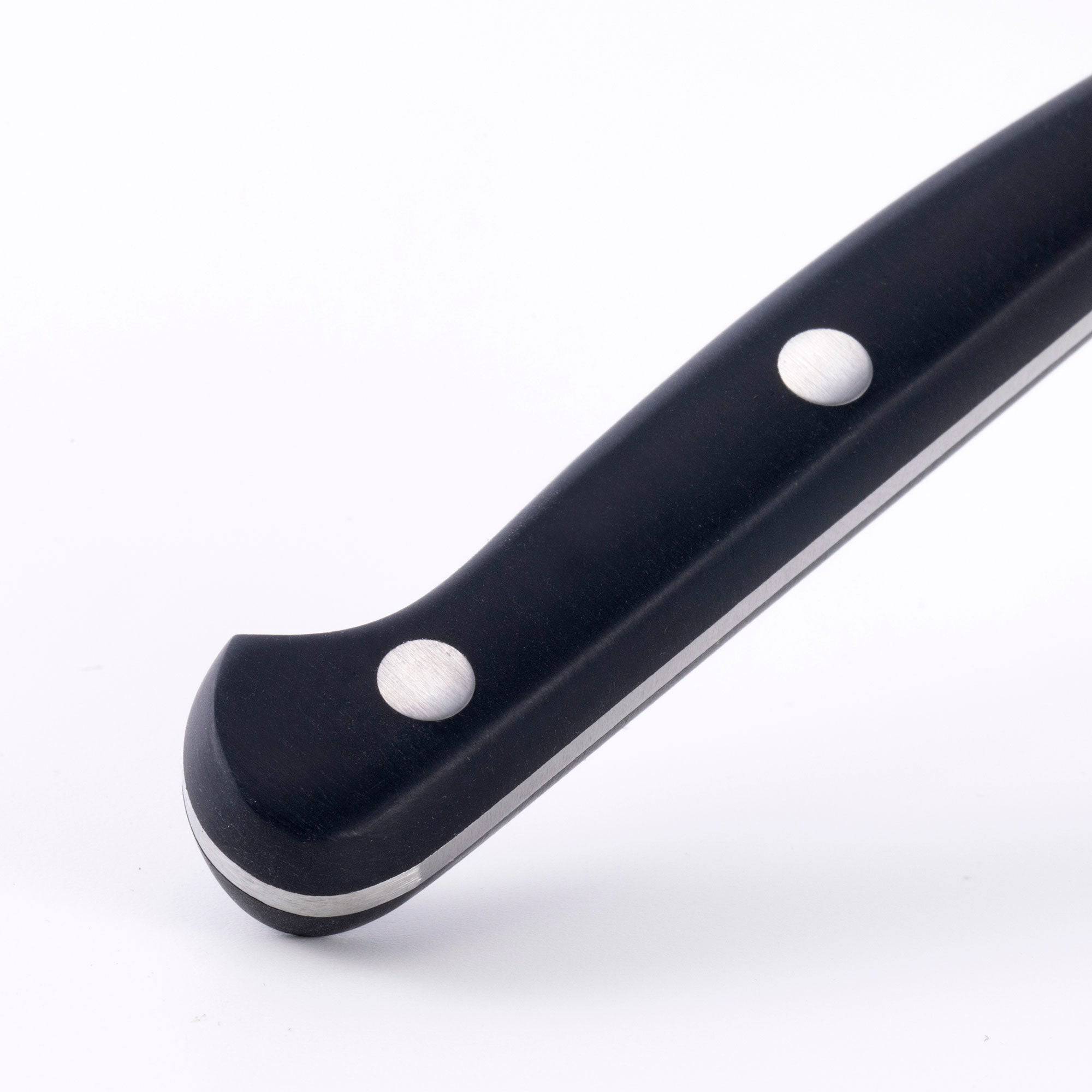 The Meridian Elite 3.5 inch Sheep's Foot Paring Knife close up of the triple rivet black handle