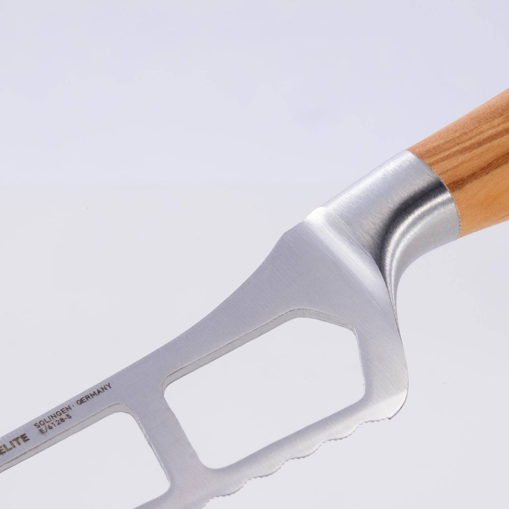 A close up view of the Oliva Elite Cheese and Tomato Knife showing the holes in the blade, bolster, and olive wood handle