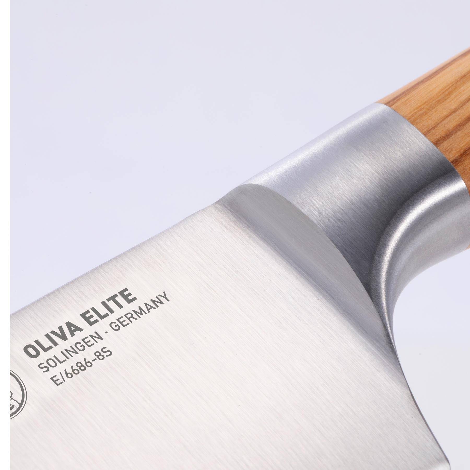 Close up of the Oliva Elite 8 inch Chef's knife bolster and heel
