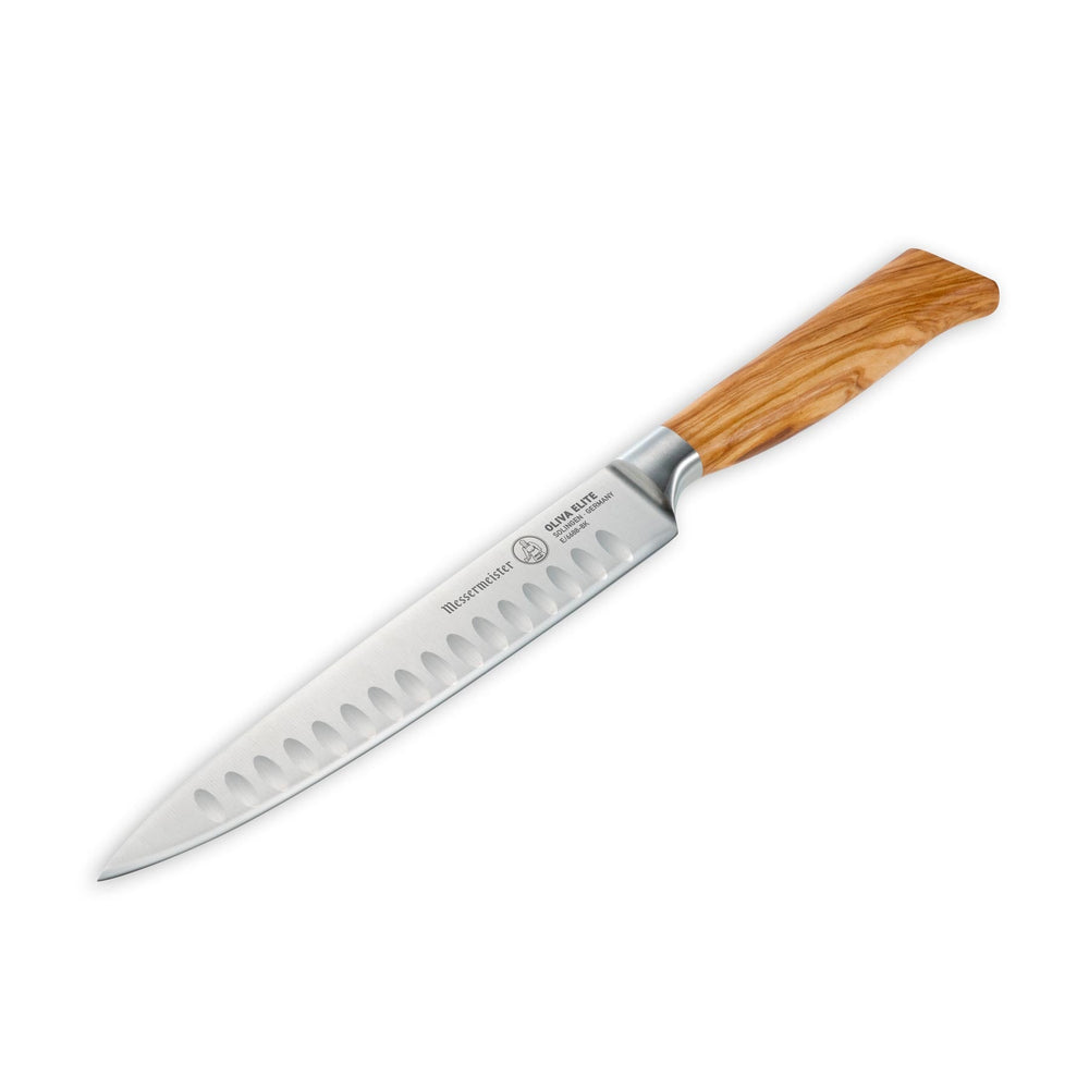 The 8 inch Oliva Elite Kullens carving knife with a narrow spearpoint, fine edge stainless steel blade with Kullens, and an olive wood handle angled view pointing to lower left