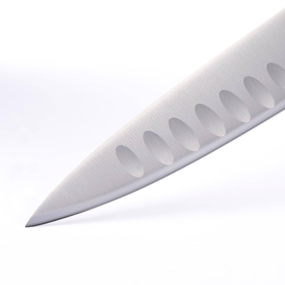 A close up of the 8 inch Oliva Elite Kullens carving knife showing the kullens and narrow spearpoint tip