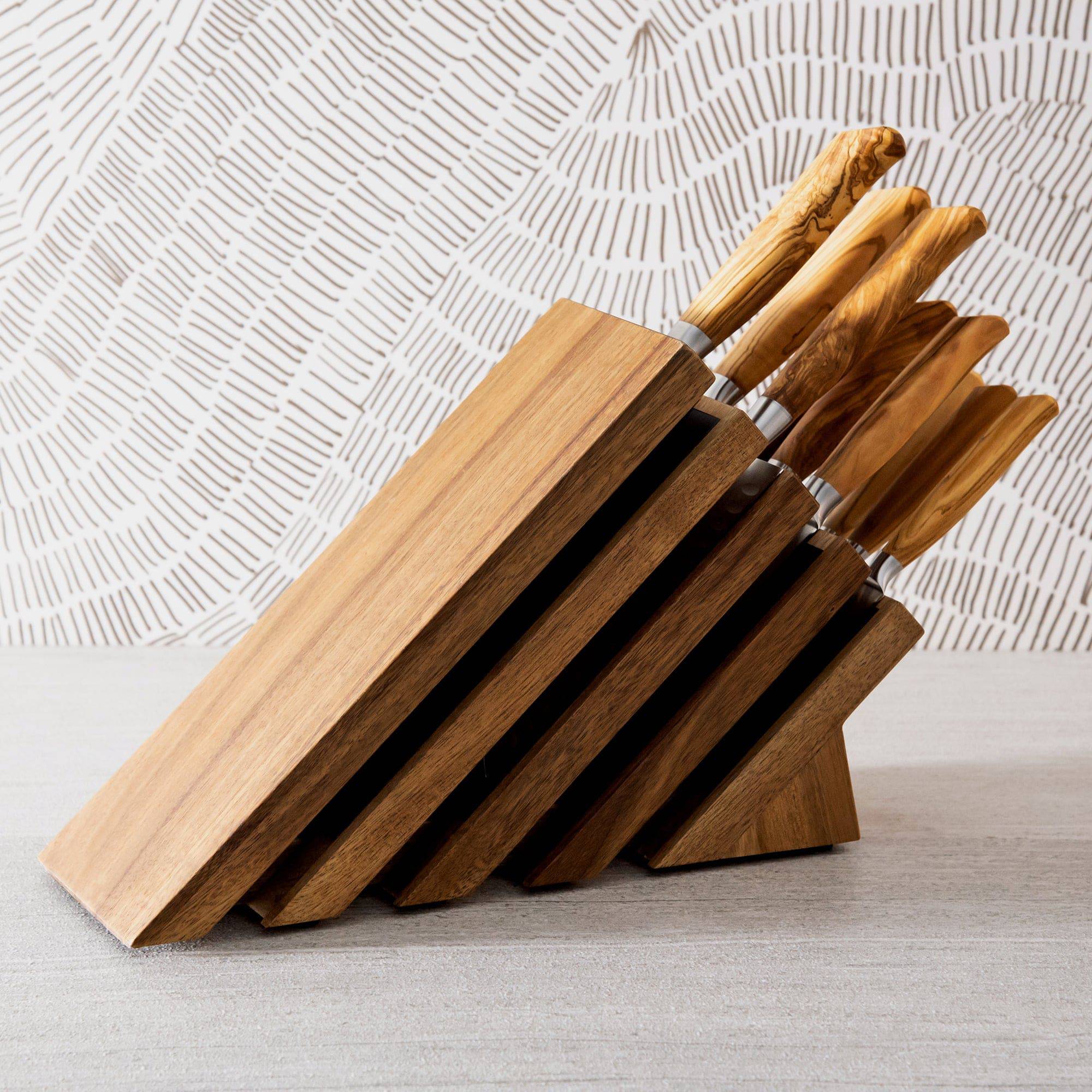 The Oliva Elite 11 Piece Next Level Block Set with all knives resting inside Next Level knife block, olive wood handles only showing