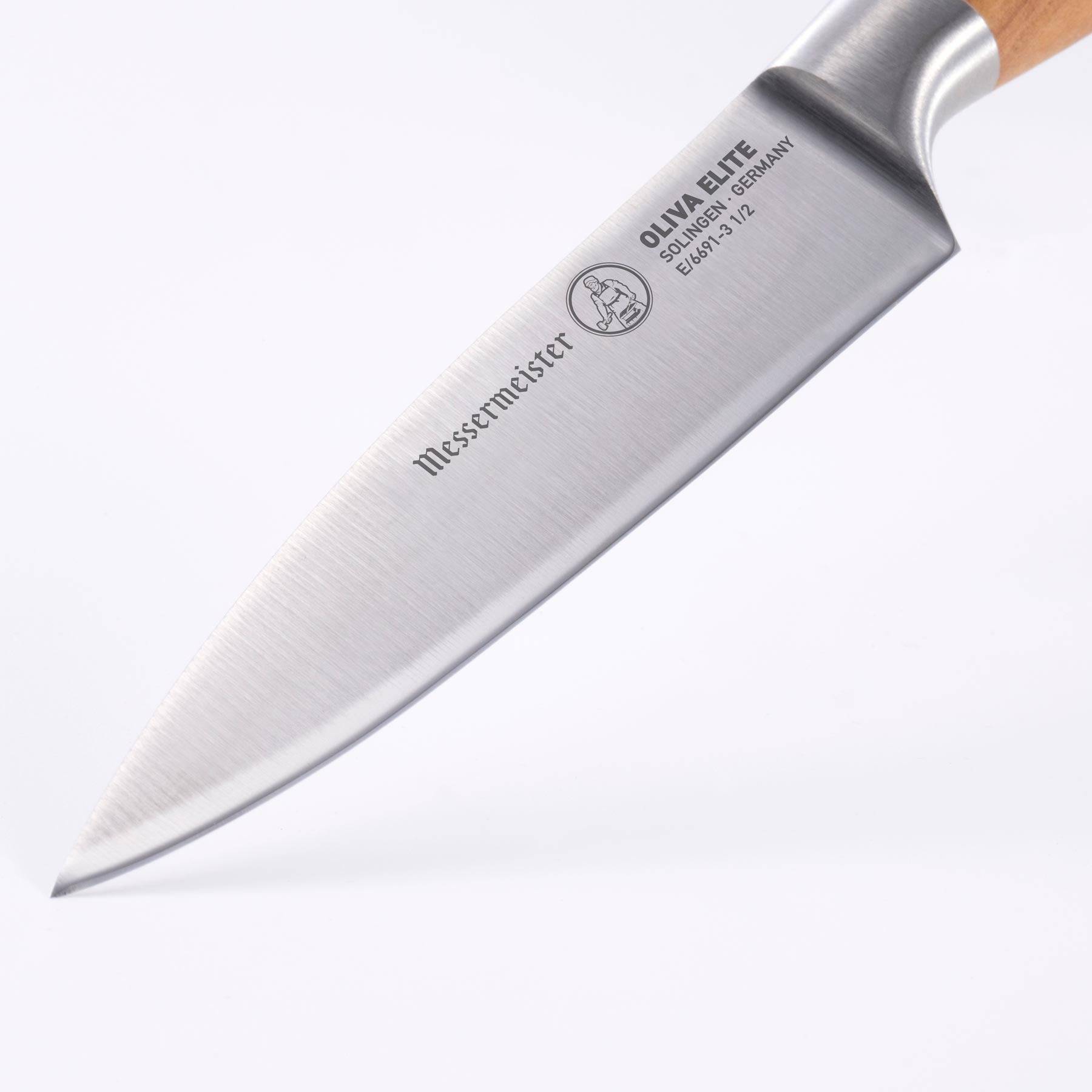 The Oliva Elite 3.5 inch Paring Knife close up view of tip and logo