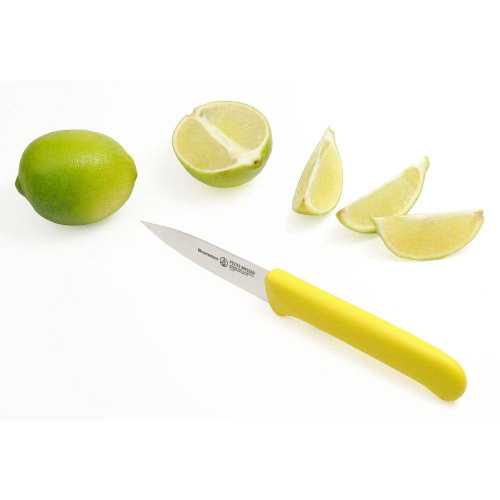 Messermeister Petite Messer yellow 3 inch spear point parer slicing fresh limes for garnish and prep work