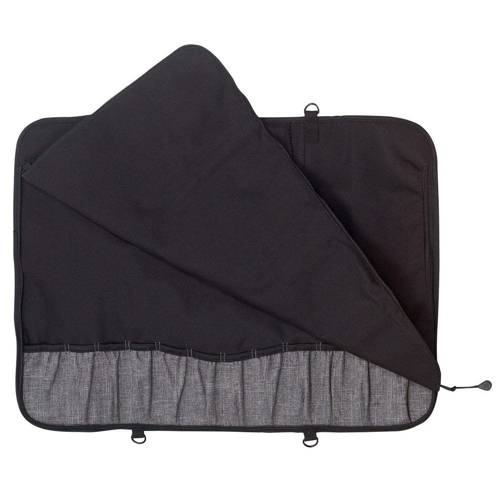 Interior view of Messermeister Preservation 12 Pocket Knife Bag in Black showing padded lining and elastic knife pockets designed to securely organize up to twelve chef knives and culinary tools