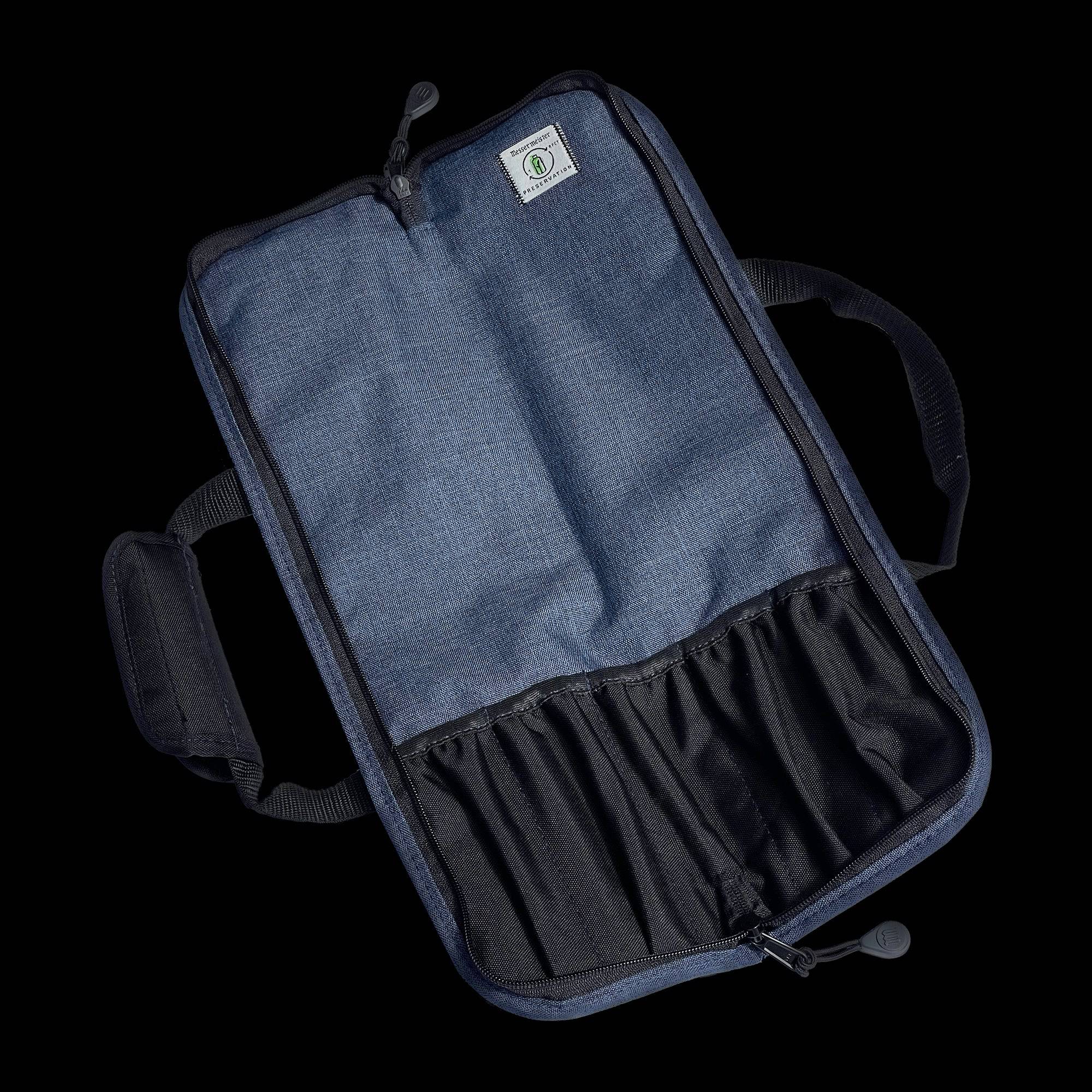 Open Messermeister Preservation 5 Pocket Knife Bag in Heather Navy showing padded interior compartments, secure elastic knife slots, and organized storage for up to five chef knives and culinary tools