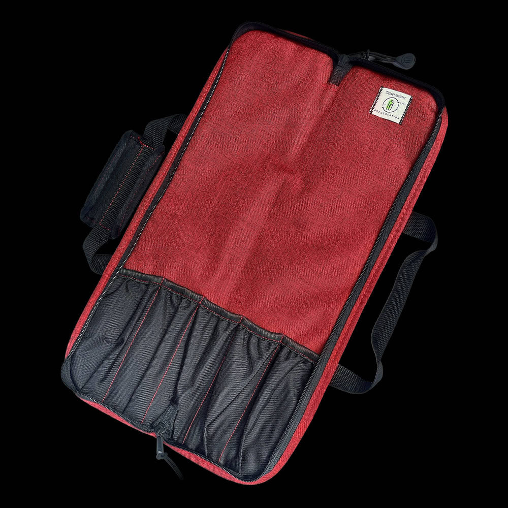 Open Messermeister Preservation 5 Pocket Knife Bag in Heather Red showing padded interior compartments, secure elastic knife slots, and organized storage for up to five chef knives and culinary tools