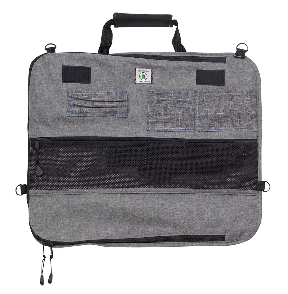 Interior view of Messermeister Preservation 8 Pocket Knife Bag in Gray showing padded lining, elastic knife slots, and organized compartments designed to securely hold up to eight chef knives and culinary tools