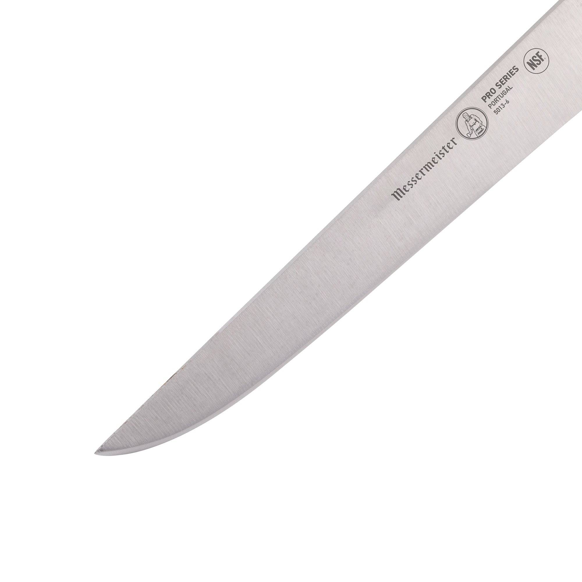 Close-up of Messermeister Pro Series stiff boning knife blade showing rigid stainless steel construction and precision-ground cutting edge