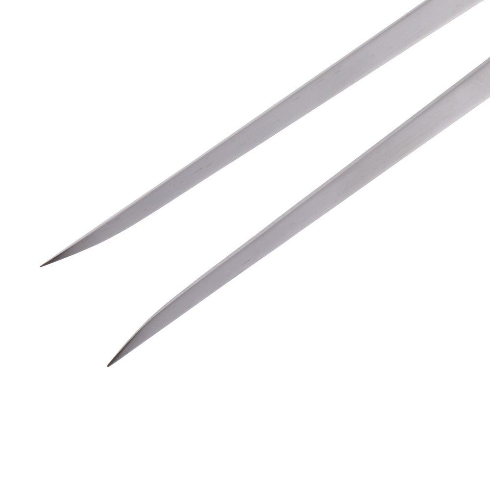 Detail view of stainless steel tines on Messermeister Pro Series 7-inch straight carving fork designed for stable meat holding during slicing