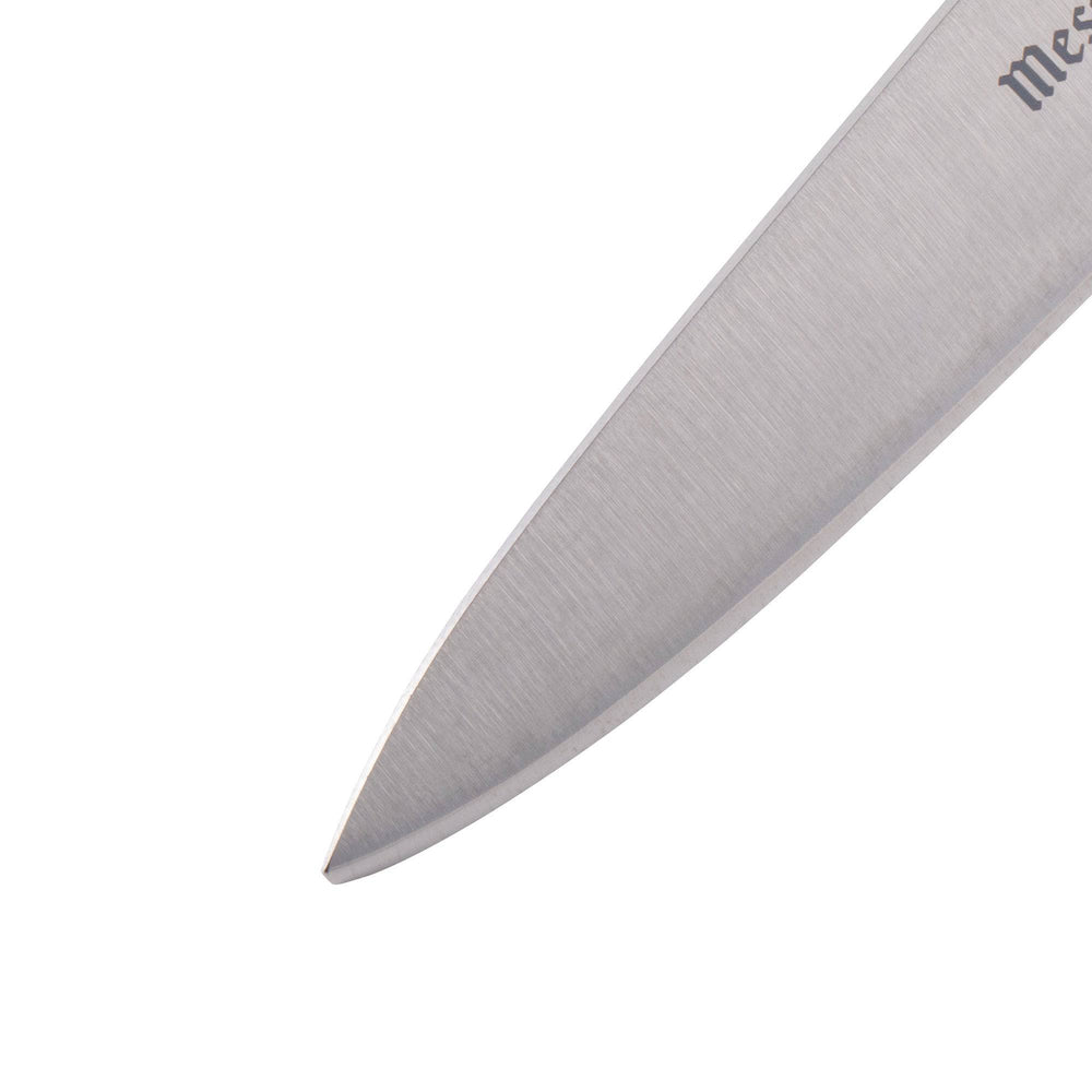 Close-up of Messermeister Pro Series utility knife blade, razor-sharp edge for precise kitchen prep