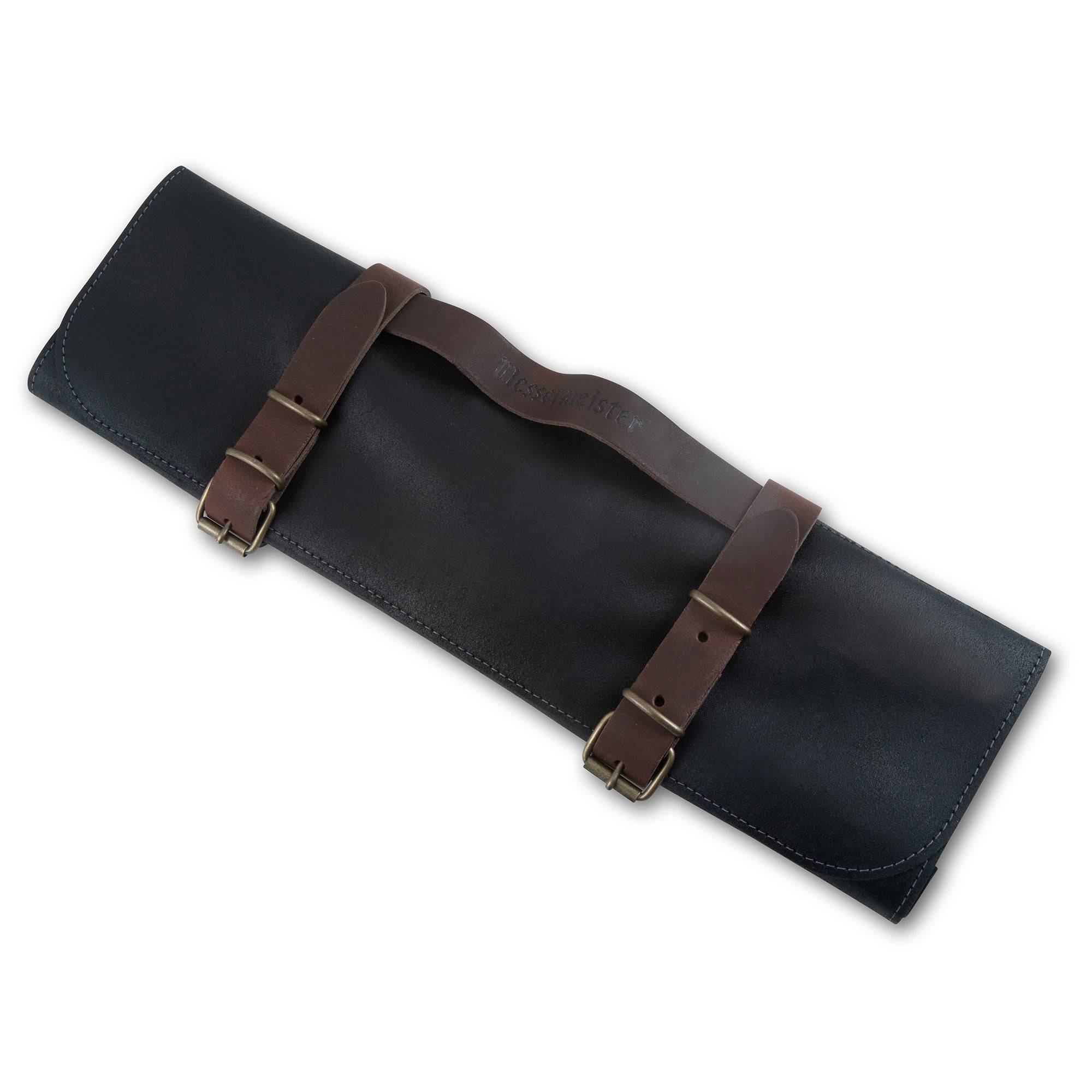 Close-up of the Messermeister Vintage Leather 7 Pocket Knife Roll in black, highlighting the premium full-grain leather texture, handcrafted stitching, embossed logo detailing, and durable construction designed for professional chef knife storage and transport