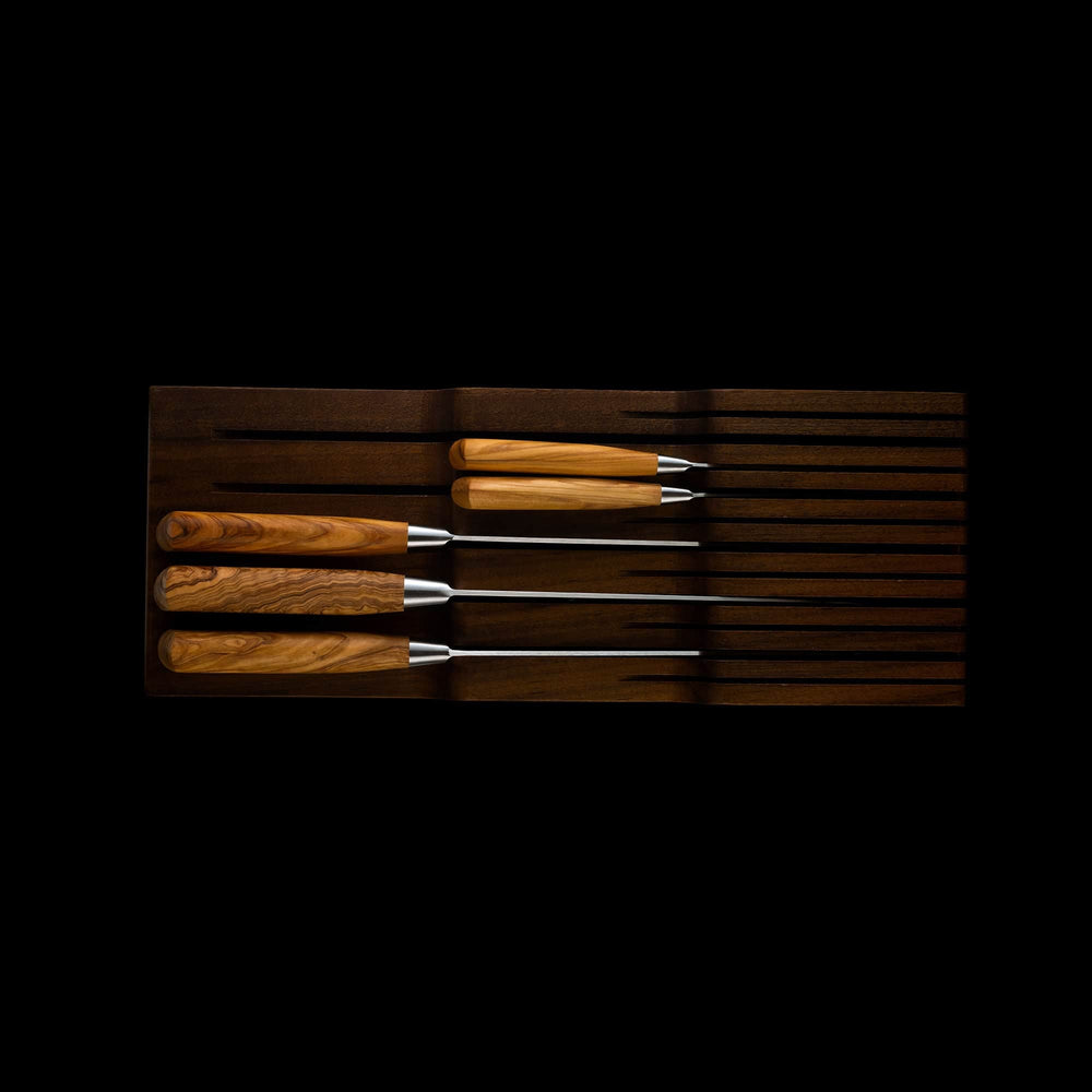 Messermeister 11 Slot Contemporary Acacia In-Drawer Knife Holder shows a top view of the knife holder with 5 Olive wood handled knives in the slots.